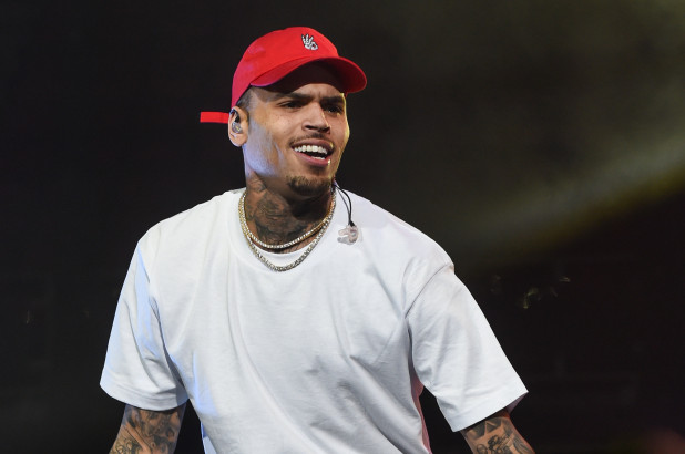 Chris Brown Says He's 'Single With a Girlfriend' on Respectfully Justin Premiere