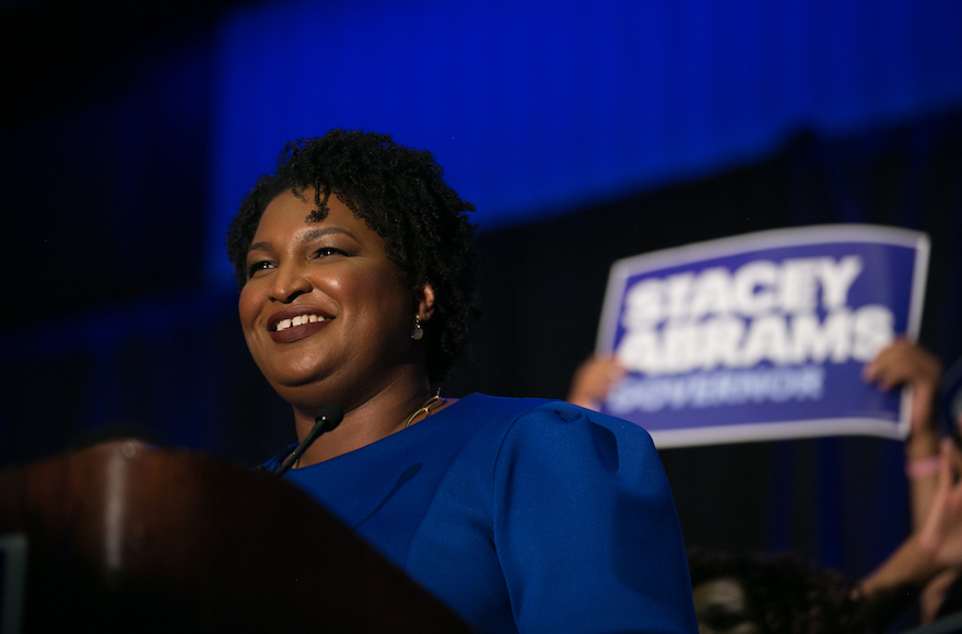 Stacey Abrams Defends 1992 Flag Burning Protest